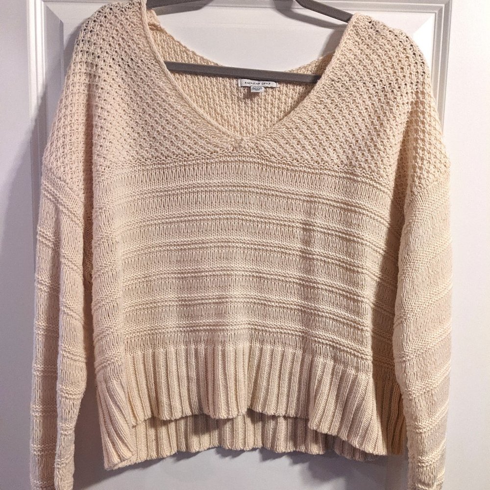 American Eagle cream v-neck sweater, size XL.